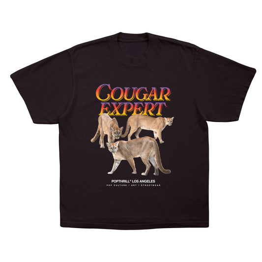 Cougar expert, cougar specialist, and cougar whisperer. Oversized graphic t-shirt, drop shoulders, loose fit tee.